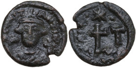 Constans II (641-668). AE Half Follis, Carthage mint. Obv. Bust facing, wearing consular robes and crown with trefoil ornament, holding mappa and glob...