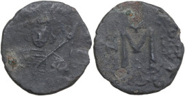 Tiberius III, Apsimar (698-705). AE Follis. Constantinople mint. Obv. Crowned and cuirassed bust facing, holding spear and shield decorated with horse...