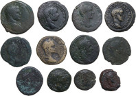 The Roman Empire. Multiple lot of twelve (12) bronze provincial coins.