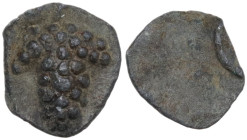The Roman Empire. PB Tessera, 1st century BC-1st century AD. D/ Bunch of grapes. R/ Blank. PB. 0.38 g. 8.00 mm. Edge of the flan folded over. About VF...