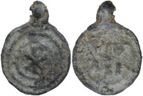 Leads from Ancient World. PB Lead seal. Roman Empire. D/ Chi-Rho in three circles of pellets. R/ VIV/ABI (?). PB. 2.03 g. 22.00 mm. Very interesting t...