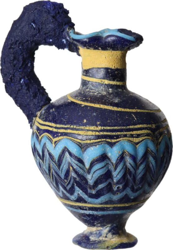 PUNIC MULTICOLOR OINOCHOE Punic world, c. 6th century BC. Small oinochoe in mult...