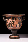 Ca. 400-300 BC.
A beautiful red-figure terracotta krater with a broad rim, bell-shaped body flanked by two lug handles, and a pedestalled ring foot. S...