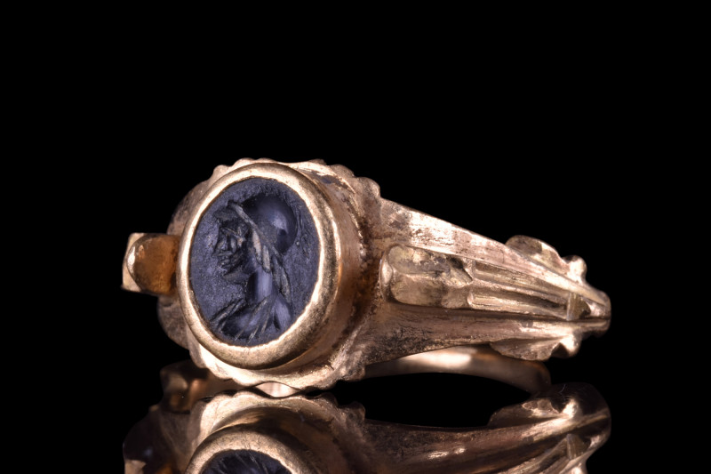 Ca. 100-300 AD.
A black gemstone intaglio depicting a left-facing portrait of a ...