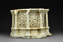 Ca. 300-900 AD.
A drum-shaped marble chest in the form of a tholos surrounded by eight columns with simple capitals, arcades between the pillars with ...