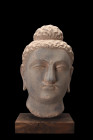 Ca. 100-200 AD.
A schist stone, over the lifesize head of Buddha with naturalistic features of the head including deep-set almond-shaped half-closed e...