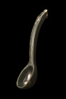 Ca. 17th century AD.
A jade spoon with a deep, round bowl and a delicately curved handle, culminating in a pierced top that adds a touch of elegance t...