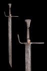 Ca. 1300-1400 AD.
An iron falchion with a single-edged, asymmetric blade, with a short back edge, the hilt gently tapering to the left side ending wit...