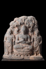Ca. 200-300 AD.
A schist relief panel with the seated Buddha attended by Brahma and Indra, as well as two Bodhisattvas. It is an exquisite ensemble of...