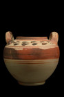 Ca. 400-300 BC.
A Messapian lebes gamikos, a delicately formed "marriage vase" with an inverted bell-shaped body and its characteristic pair of horizo...