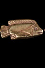New Kingdom, ca. 1550-1069 BC.
A golden amulet in the shape of a tilapia fish. A cast gold amuletic bead with a suspension hole through the centre. Th...