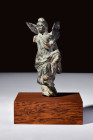 Ca. 100-300 AD.
A bronze figurine encapsulates Victory in a moment of sublime poise. Captured in a standing posture, her form radiates an aura of dign...
