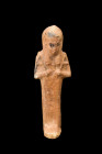 Late Period to Ptolemaic Period, ca. 664-30 BC.
This ushabti of its characteristic mummiform style stands atop a petite and flat base. The hands are e...