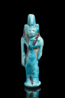 Late Period, ca. 664-332 BC.
A blue-glazed composition amulet of Bastet, a revered deity often depicted as a feline-headed figure with a human body, s...
