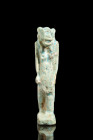 Late Period, ca. 664-332 BC.
A glazed composition amulet depicting the goddess Tawaret standing in a confident posture, with arms held at the sides of...