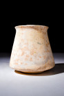 New Kingdom, ca. 1550-1070 BC.
A stone vessel stands resolute upon a raised base, its form an embodiment of subtlety and elegance. With a body that gr...