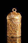 Ca. 100 AD.
A gold pyxis, characterized by its tubular body and crowned by a meticulously domed lid, further embellished with an elegant suspension lo...