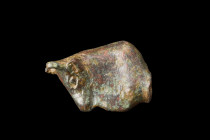 Ca. 100-200 AD.
A bronze bull protome - a decorative element that represents the front part of an animal or human figure. In this case, it portrays th...