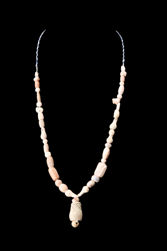 Ca. 100-300 AD.
A stone beaded necklace, composed of variously shaped beads, sho...
