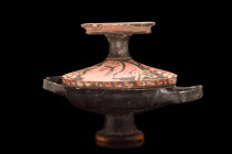 Ca. 340-325 BC.
A pottery lekanis comprises two distinct components, each with its functional design. The lower portion features a footed bowl adorned...