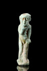 Ca. 664-332 BC.
A light blue glazed faience amulet representing the god Horus as a child. Horus strides upon a rectangular plinth. A back pillar, whic...