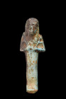 Late Period, 30th Dynasty, Ca. 332 BC.
An ushabti, fashioned from light blue glazed composition, captures attention with its refined artistry and prof...