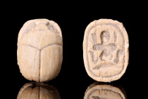 Ca. 1550-1070 BC.
A steatite Egyptian scarab with incised features such as the clypeus, prothorax, and elytra marked by single lines. The scarab is de...