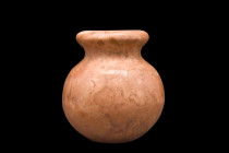 Ca. 3000-2000 BC.
A stone jar distinguished by its remarkable features and meticulous craftsmanship. Hewn from stone, this jar boasts a bulbous lower ...