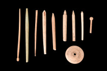 Ca. 2nd-4th century AD.
A collection of bone medical and cosmetic tools. Each tool features a round-section handle and a variety of ends, carefully cr...