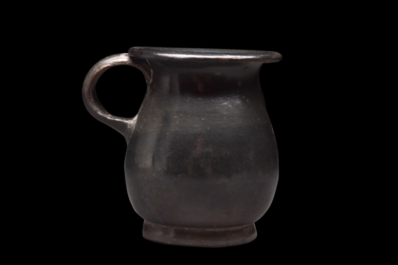 Ca. 400-300 BC.
Fashioned from pottery, this cup exhibits a captivating and dist...