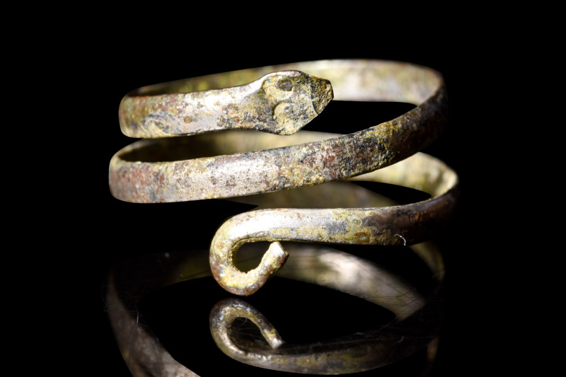 Ca. 1st century BC - 1st century AD.
A bronze ring fashioned into the form of a ...