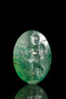 Ca. 100-300 AD.
A bloodstone intaglio graced with a depiction of goddess Victory. The form, an elegant oval-shaped gem, commands attention with its gr...
