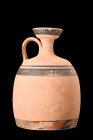 Ca. 8th-7th century BC.
A pottery vessel in the form of a squat lekythos. This artifact features a broad, bell-shaped lower body, and a tubular neck t...