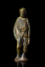 Ca. 1st-2nd century AD.
A bronze figurine of cloaked Asclepios, an enigmatic figure steeped in the depths of myth and devotion. Asclepios, the divine ...