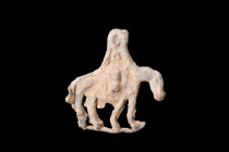 Ca. 100-200 AD.
A lead votive horse and rider figurine captures a remarkable scene of equestrian prowess and devotion. Crafted in lead, this figurine ...