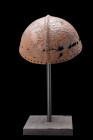 Ca. 9th-13th century AD.
A rare iron skull-cap, crafted in the shape of a hemisphere to fit snugly over the human head. The design of this piece is si...