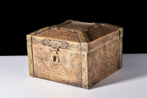 Ca. 19th-20th century AD.
A resplendent Qur'an box crafted in a rectangular silhouette. Its hinged lid, a coffered marvel with gently sloping sides, c...