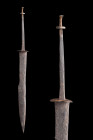 Ca. 1400 AD.
A hand-forged single-edged dagger with triangular-section blade, elliptical guard with arched profile, tapering tang, and rondel-style di...