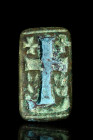 Ca. 600-800 AD.
A rare bronze seal etched with meticulous precision presents a tableau of spiritual symbolism. A large, imposing cross, occupying the ...