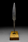 Ca. 10th-11th century AD.
An iron seax blade with a straight cutting edge and angled back, the tang offset from the blade. Its hilt would have been ma...