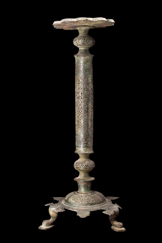 Ca. 1100-1200 AD.
This exceptional artifact, crafted from lustrous bronze, stand...