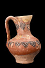 Ca. 10th century AD.
A pottery jug with distinctive form, exhibits a flat, circular base that provides stability, while the bulbous body gracefully ta...