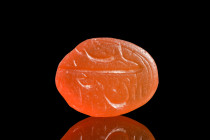 Ca. 19th century AD.
A carnelian gem of elegant, oval shape, commands attention with its harmonious proportions. This exquisite relic bears witness to...