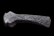 Viking Age, ca. 900-1100 AD.
An axe head with a curved profile and a flaring blade that culminates in a formidable cutting edge. Crafted from enduring...