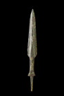 Western Asiatic/Aegan, ca. 1200-700 BC.
A bronze spearhead crafted with exceptional skill, it features a double-edged blade in a distinct leaf shape, ...