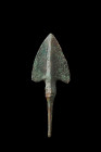 Western Asiatic/Aegan, ca. 1200-700 BC.
A bronze spearhead with a triangular-shaped blade that gracefully tapers to a finely sharpened point. A promin...