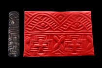 Ca. 2900 BC.
Cylinder seal of black stone. Two registers: crossing looping bands in one; rosette and elaborate Greek cross in the other. Condition ver...