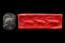 Ca. 3000 BC.
Cylinder seal of black stone. Frieze of three walking horned animals with something above their backs. Accompanied by a signed scholarly ...