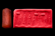 Ca. 8th-7th century BC.
A red stone Neo-Assyrian cylinder seal from the 8th or 7th century BC. It depicts the winged god Assur above a stylized life t...