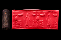 Ca. 8th-7th century BC.
A black coloured cylinder seal, likely from the western periphery of the Neo-Assyrian empire (East Anatolia or Cyprus), 8th - ...